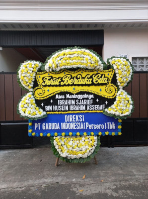 Papan Bunga Duka di Purwaharja